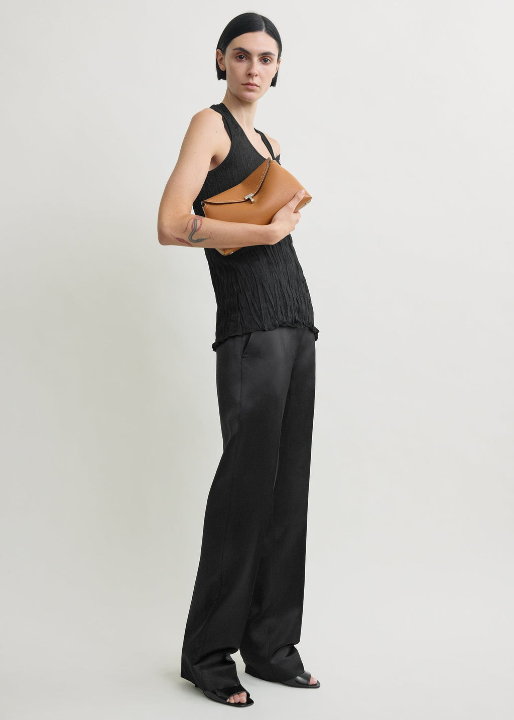 T-lock grained-leather clutch tan